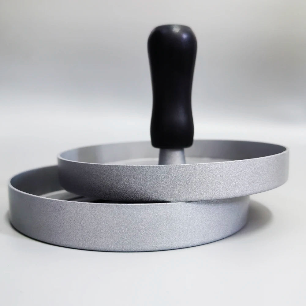 Burger press with black handle